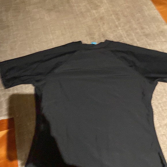 UV swim shirt. Size: Woman’s medium. Black short sleeve shirt. Brand: Halcurt - Picture 3 of 3